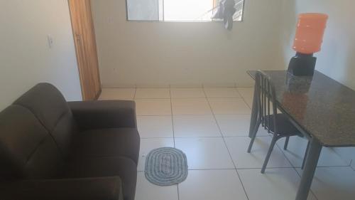 Et opholdsområde på Apartamento Confortável Av Brasil