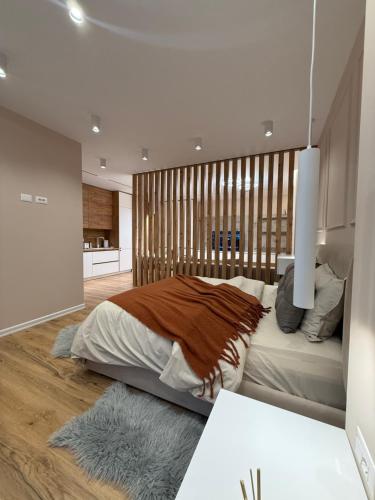 Ένα ή περισσότερα κρεβάτια σε δωμάτιο στο Sapphire Residency