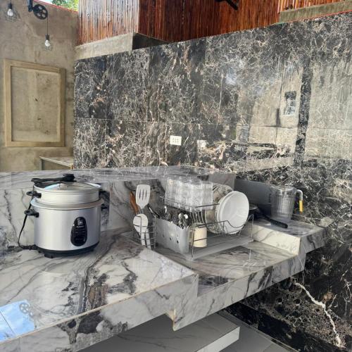 Kuchyň nebo kuchyňský kout v ubytování greyhouse moalboal