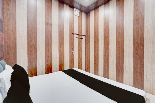 Ένα ή περισσότερα κρεβάτια σε δωμάτιο στο SPOT ON The Yeble Hotel And Restaurant