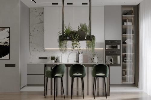 a kitchen with a kitchen island with green chairs at Ático de lujo para 7 personas in Cartagena de Indias