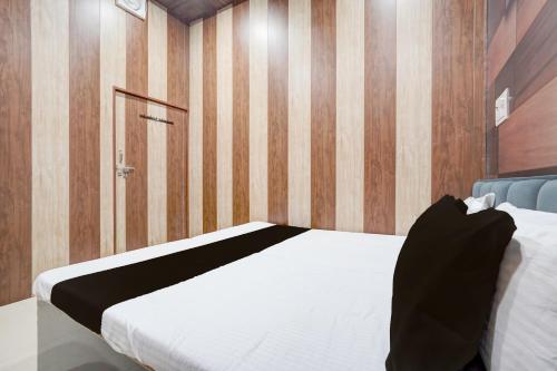 Ένα ή περισσότερα κρεβάτια σε δωμάτιο στο SPOT ON The Yeble Hotel And Restaurant