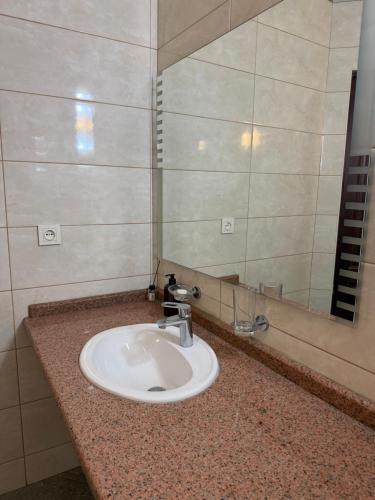 Ένα μπάνιο στο Номера в уютном отеле Sofia-Promenade