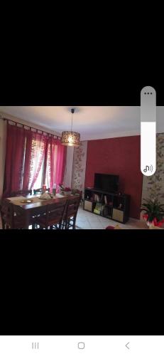 a living room with a dining room table and a dining room at La Peonia in Vitorchiano