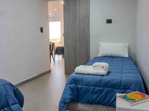 Postel nebo postele na pokoji v ubytování Don Alberto Departamento 2