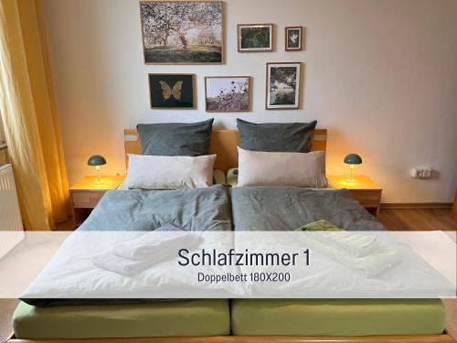 a bedroom with two beds and two lamps at Ferienwohnung am Maximilianpark Hamm in Hamm