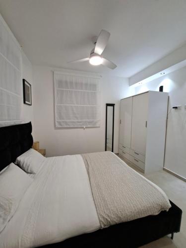 Ένα ή περισσότερα κρεβάτια σε δωμάτιο στο K Home 2