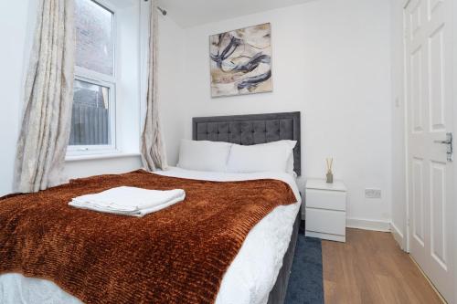 Una cama o camas en una habitación de Urban Nest