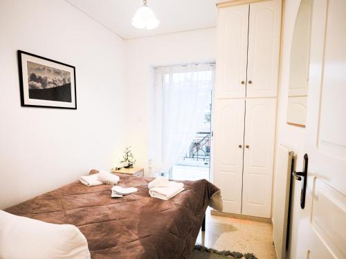 Ένα ή περισσότερα κρεβάτια σε δωμάτιο στο tripoli center apartment