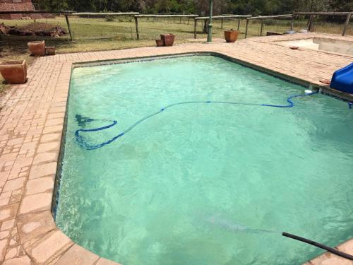 Πισίνα στο ή κοντά στο Loubad Guest Farm