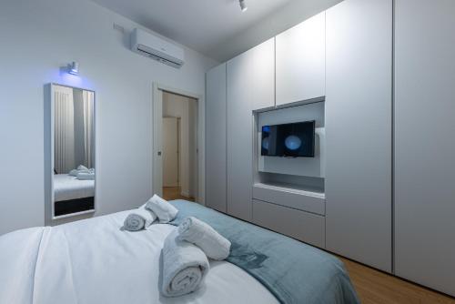 Ένα ή περισσότερα κρεβάτια σε δωμάτιο στο Luxury Apartment Near Milan - 6 Guests - Metro M2