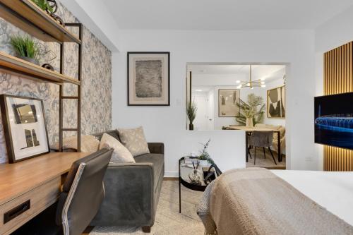 a living room with a couch and a table at The Sherbrooke Suite 101 in Montreal