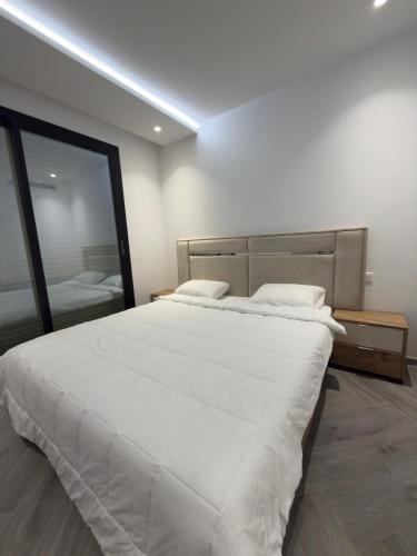 Postel nebo postele na pokoji v ubytování apartment lac 2