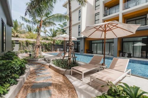 La alberca dentro o cerca de Stylish Beachfront 2BR Flat