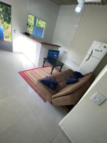 Televiisor ja/või meelelahutuskeskus majutusasutuses casa de temporada litoral Boraceia Beach