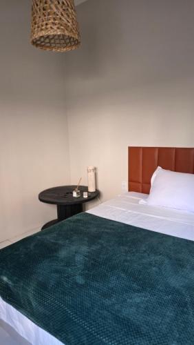 En eller flere senge i et værelse på Vida & Brisa