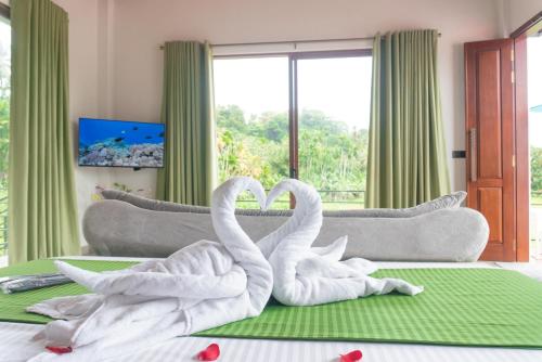 Телевизор и/или развлекательный центр в Villa Paddy Breeze