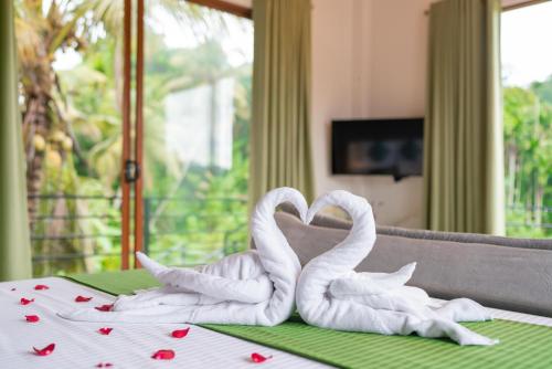 Ένα ή περισσότερα κρεβάτια σε δωμάτιο στο Villa Paddy Breeze