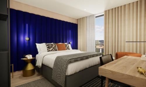 En eller flere senge i et værelse på Hotel Indigo Gloucester - The Forum by IHG