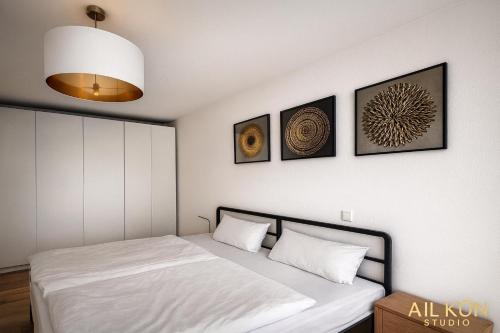 Ένα ή περισσότερα κρεβάτια σε δωμάτιο στο AIL Kün Studio