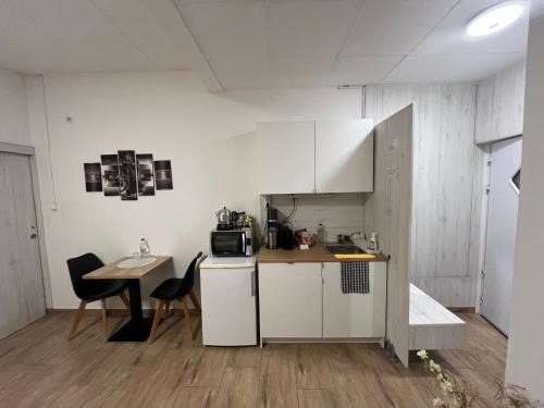 Køkken eller tekøkken på MaBy Wellness Apartment