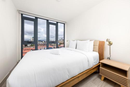 Ένα ή περισσότερα κρεβάτια σε δωμάτιο στο Casco View Life