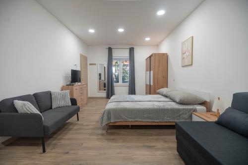 Ένα ή περισσότερα κρεβάτια σε δωμάτιο στο Studio apartman MALA OAZA