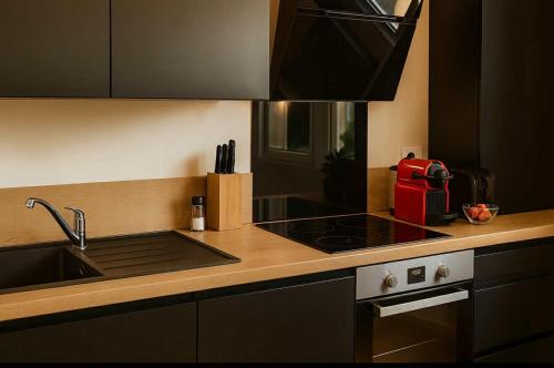 Η κουζίνα ή μικρή κουζίνα στο White House Dhavernas - Résidence Privée - Amiens - Parking Gratuit