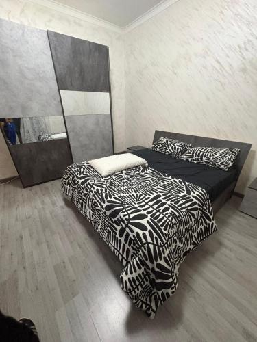 Un pat sau paturi într-o cameră la Gioeni PARK HOUSE