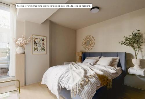 En eller flere senge i et værelse på Luxurious and super central apartment with balcony