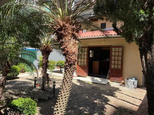 Κήπος έξω από το Casa ao mar -Pousada Itapema