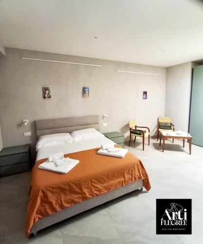 Ένα ή περισσότερα κρεβάτια σε δωμάτιο στο Arti Flegree