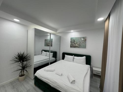 Ένα ή περισσότερα κρεβάτια σε δωμάτιο στο Luna Place