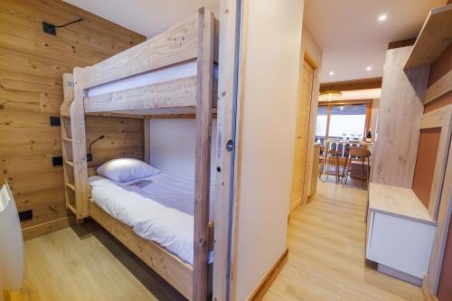 Postel nebo postele na pokoji v ubytování RESIDENCE OLYMPIE 1