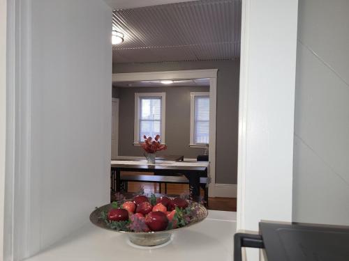 a bowl of fruit on a table in a room at Apt 2 2nd Floor in the Heart of the City in Worcester