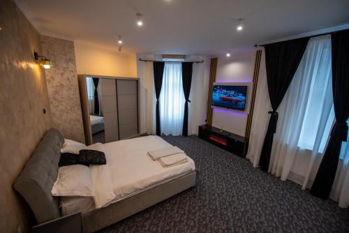 Voodi või voodid majutusasutuse Vibe90 apartament centru istoric toas