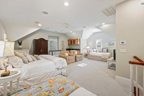 a living room with a couch and a table at HH2482: 2482 High Hammock Road in Seabrook Island