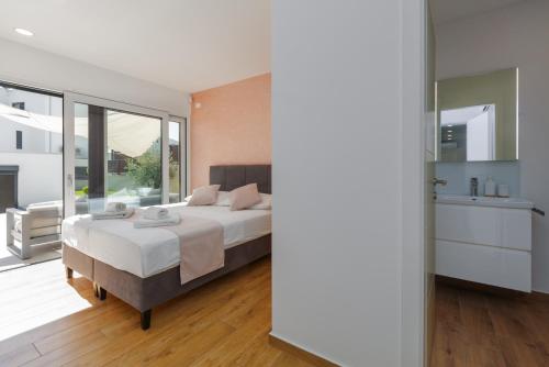 Ένα ή περισσότερα κρεβάτια σε δωμάτιο στο Villa Simba