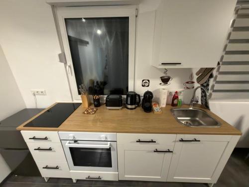 Kuchyň nebo kuchyňský kout v ubytování Mira Suites 2