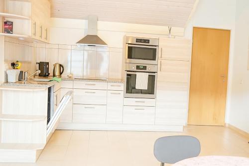 Η κουζίνα ή μικρή κουζίνα στο Homely 2,5 room apartment