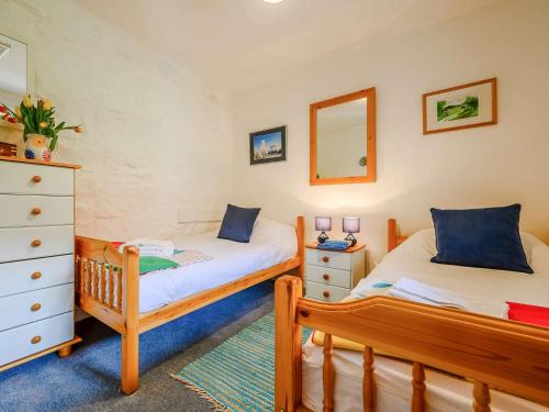 Ένα ή περισσότερα κρεβάτια σε δωμάτιο στο 3 Bed in Watermillock SZ318