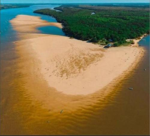 an aerial view of an island in the water at MorenoPLAZA in Concepción del Uruguay
