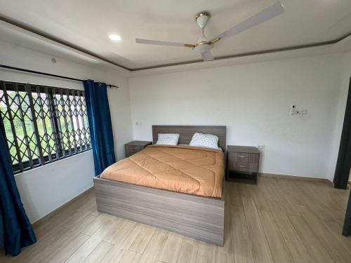 Ένα ή περισσότερα κρεβάτια σε δωμάτιο στο The Badawu Residence