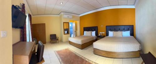 Hotel San Rafael客房内的一张或多张床位