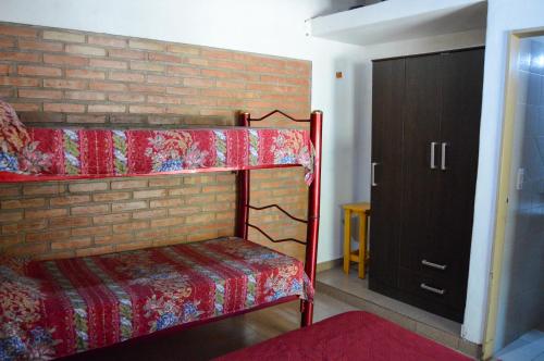 Giường trong phòng chung tại Complejo Fresia