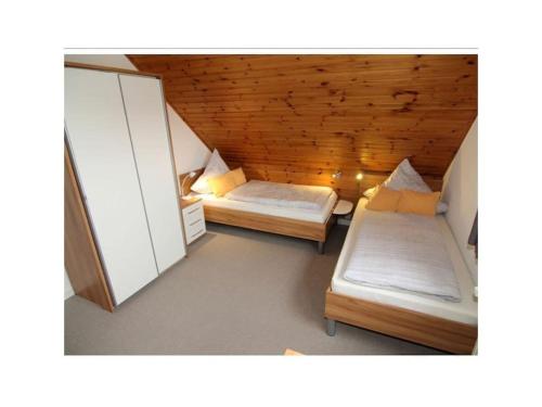 Ένα ή περισσότερα κρεβάτια σε δωμάτιο στο House Agen Apt No 2 - small