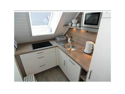 Η κουζίνα ή μικρή κουζίνα στο House Agen Apt No 2 - small