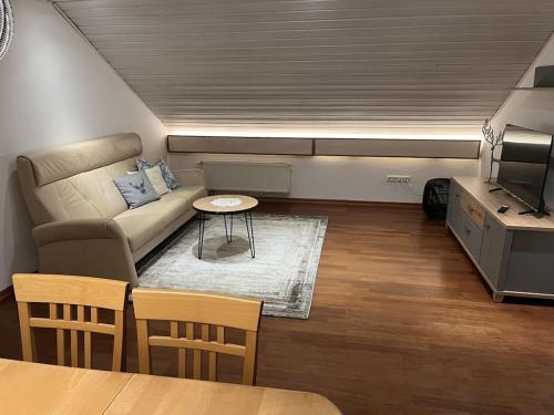 Гостиная зона в Holiday apartment with 2 bedrooms