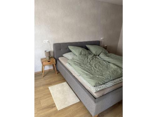 En eller flere senge i et værelse på Rhine Dream Underground