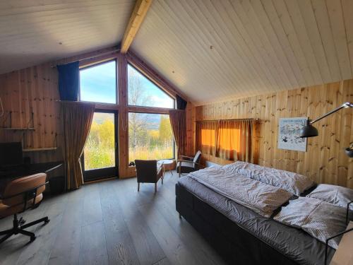 Χώρος καθιστικού στο 9 person holiday home in Øverbygd